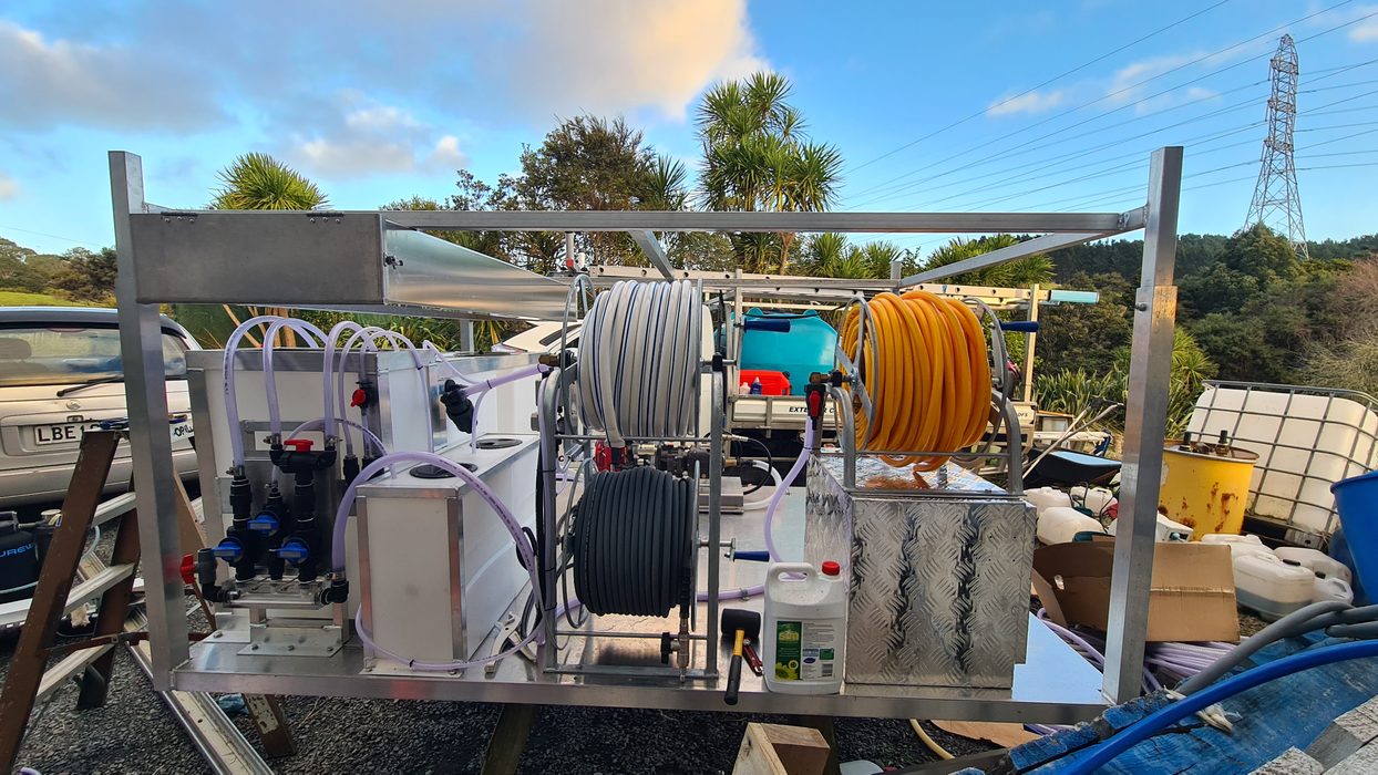 Aluminium soft wash skid with twin hose reels, blend manifold and tank, built by Softwash Source